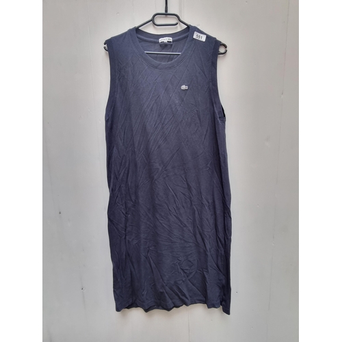 A 'Lacoste' sleeveless cotton dress. Size: UK14