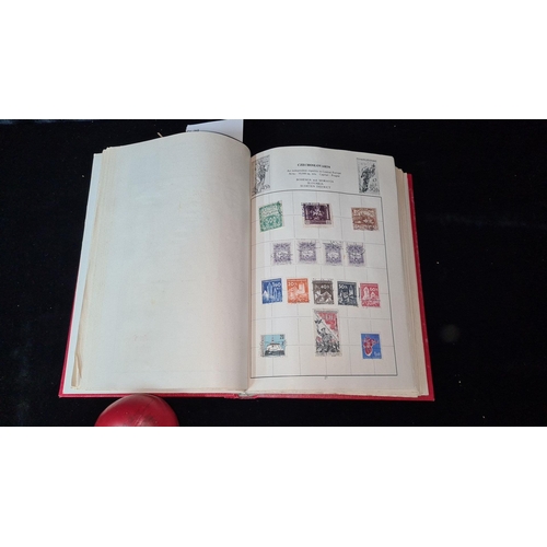 792 - Cardinal Illustrated Loose-Leaf Stamp Album containing a varied collection of world stamps, includin... 