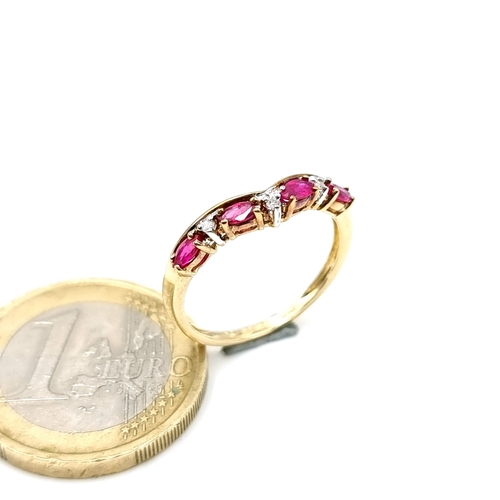 1133 - Star Lot : A remarkable 9kt (375) ruby and diamond ring. Ring size L. Weight 1.48g.