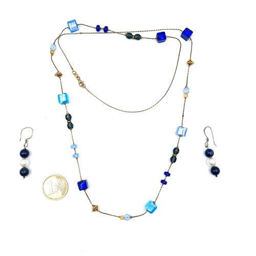 1146 - A lovely beaded necklace stamped 925, along with navy and pearl like drop earrings. Length of chain ... 