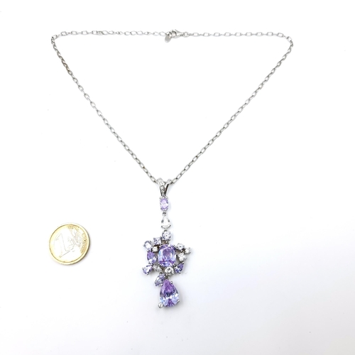 1149 - A beautiful sterling silver amethyst pendant necklace. Length of necklace 45cm, Pendant 7cm. Weight ... 