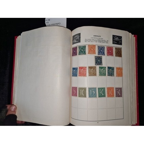 792 - Cardinal Illustrated Loose-Leaf Stamp Album containing a varied collection of world stamps, includin... 