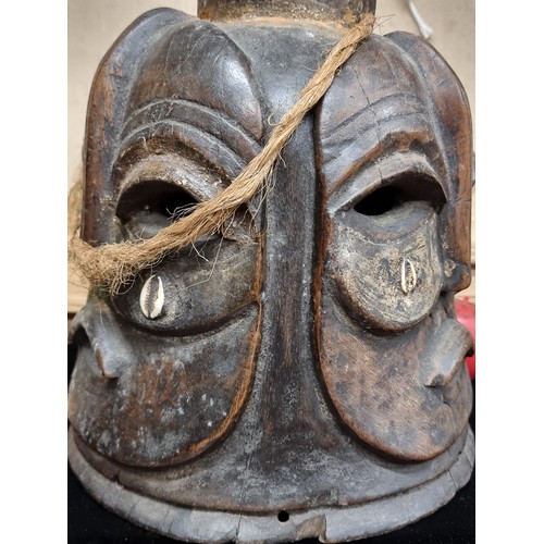 269 - Star Lot : A striking very large 4 sided vintage  African tribal wooden carved mask. Was brought bac... 