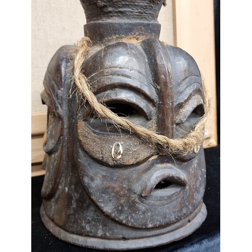 269 - Star Lot : A striking very large 4 sided vintage  African tribal wooden carved mask. Was brought bac... 