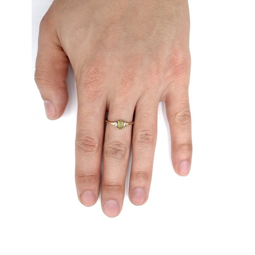 30 - A green tourmaline stone ring set in 9k gold. Ring size P. Weight 0.92g