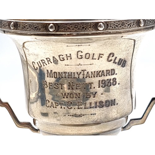 41 - A very nice example of an Irish silver presentation cup with celtic design rim. Cup marked S. H. Wat... 