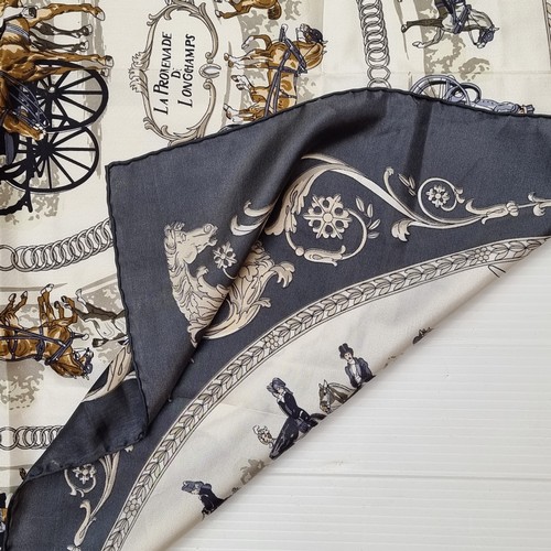 410 - An attractive LongChamps silk scarf with rolled stitched edging depicting La Promenade De Longchamps... 