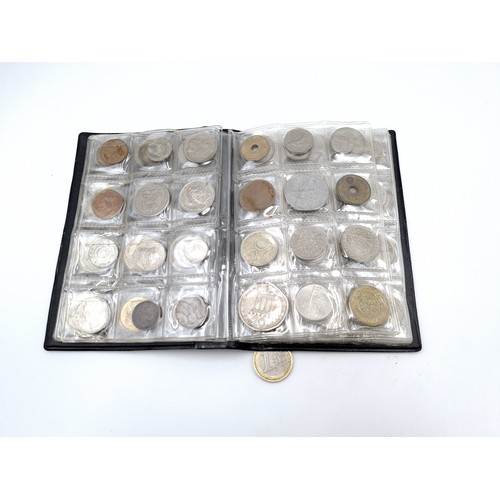 453 - A World Coin Stock wallet fully furnished containing 120 assorted coins covering numerous countries.