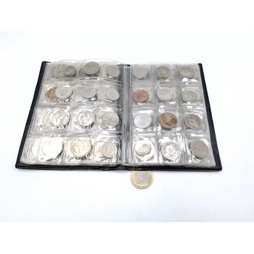 453 - A World Coin Stock wallet fully furnished containing 120 assorted coins covering numerous countries.