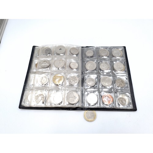 453 - A World Coin Stock wallet fully furnished containing 120 assorted coins covering numerous countries.