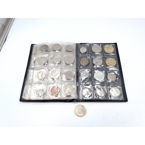 453 - A World Coin Stock wallet fully furnished containing 120 assorted coins covering numerous countries.