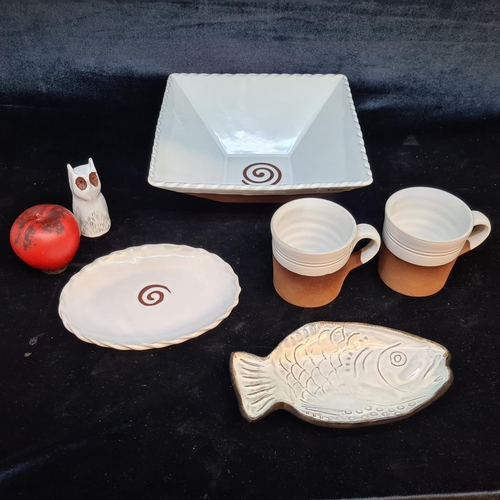 125 - A selection of Steven Pearce art studio pottery items including two mugs, a fruit bowl, a lovely orn... 