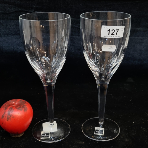 127 - A pair of large stunning John Roche by Waterford Crystal wine glasses with original sticker, acid ma... 