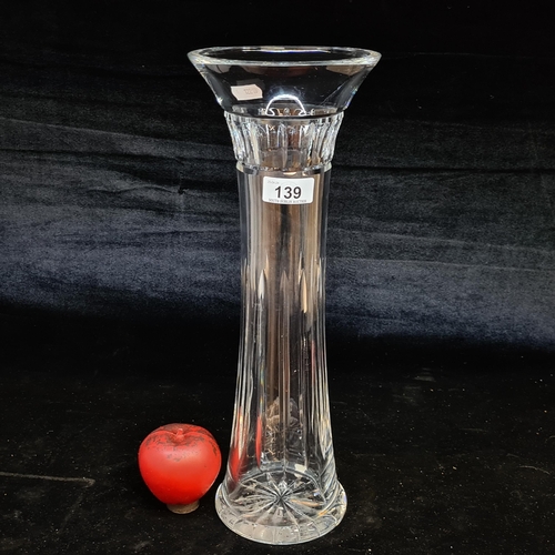 139 - An impressive tall and heavy Waterford Crystal flower vase. In very good condition with acid mark to... 