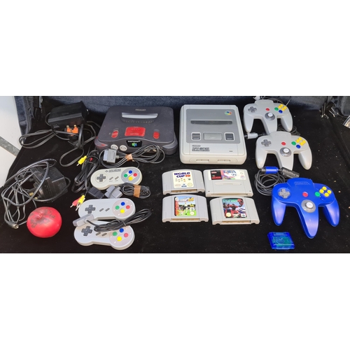 145 - A box containing 2 games consoles including retro super Nintendo entertainment system along with a N... 