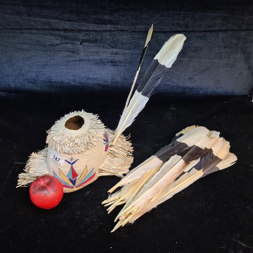 147 - A fantastic Borneo Dayak ceremonial hat along with Hornbill feathers. This comes with a bag of Black... 