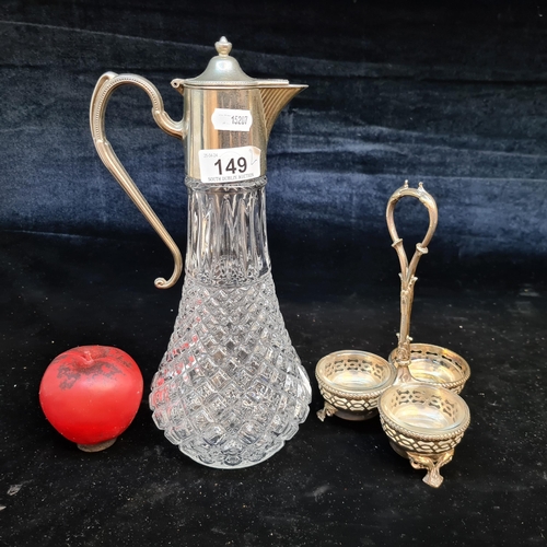 149 - Two beautiful early 20th century silver plated items including a fabulous claret jug and an ornate c... 