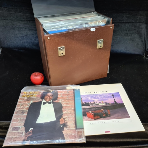 152 - A selection of 39 vintage vinyl records from artists such as Elton John, Michael Jackson, ELO, Rod S... 