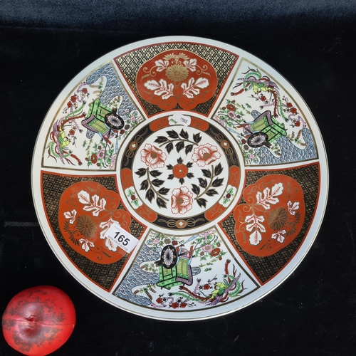 165 - A beautiful ornate hand painted Japanese charger featuring gilt gold detailing.