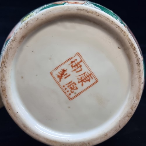 150 - A large vintage Japanese hand painted porcelain vase depicting traditional scenes. A fabulous piece.