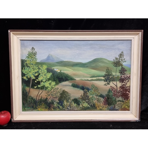 A delightful original oil on canvas painting titled "View of Sugarloaf Mountain, Co. Wicklow" dating to 1969. After work by the renowned Arthur Armstrong RHA (b.1924 - d.1996). Signed Armstrong bottom left and housed in a vintage wood and cream frame.