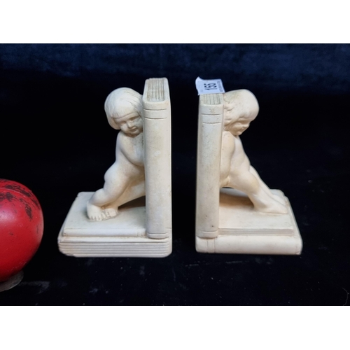 155 - A pair of c. 1930's Chalkware London made bookends in the form of young girls. Ever so slight chippi... 