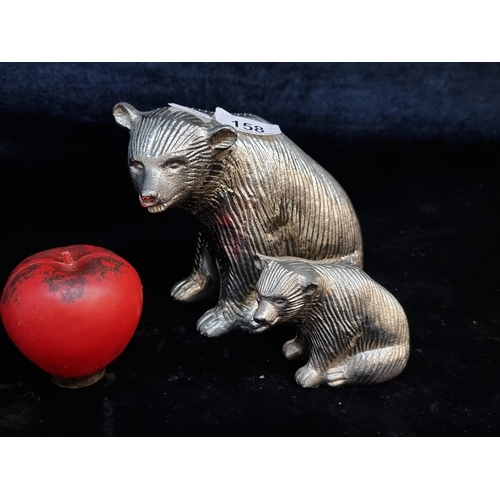 158 - Two polished chrome figurines in the form of a mother bear and cub.