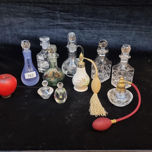 163 - A lot of 10 pretty perfume bottles varying in sizes and patterns. All come with original stoppers. S... 