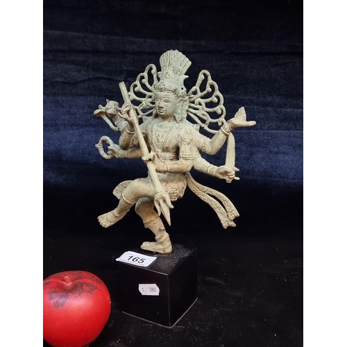 165 - A fascinating Bronze sculpture of a patinated Shiva in a dancing pose. This cosmic dance of Shiva is... 