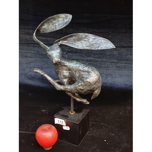 172 - Star Lot : A large Intricate heavy solid bronze sculpture depicting a whimsical hare in mid-leap, sh... 