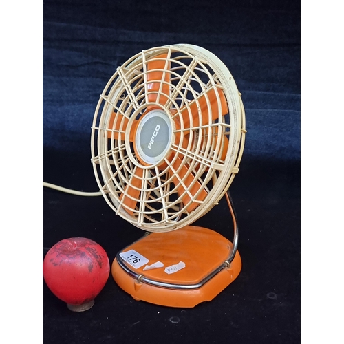 176 - A nice retro mid century  tangerine Pifco desk fan. With three pin plug.