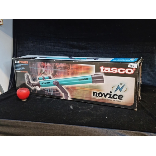 182 - An as new in box Tasco Novice 312 power refractor telescope model #30-050312.