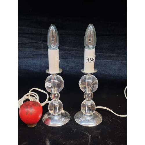 185 - A pair of Laura Ashley table lamp bases. These feature an elegant spindle form threaded with faceted... 