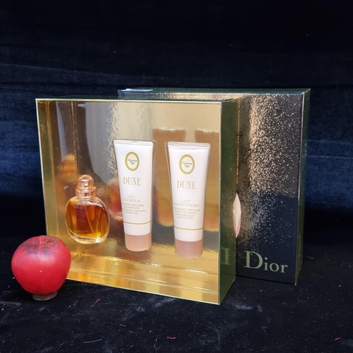 212 - An as new Dune Christian Dior Paris Perfume gift set. Includes a 30ml Eau de Toilette spray,  75ml p... 