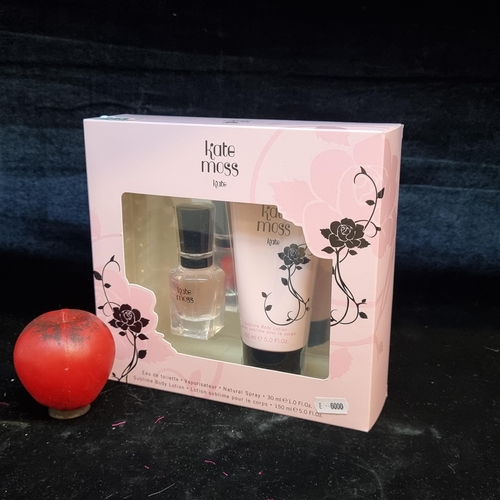 213 - A Kate Moss 'Kate' perfume gift set. Includes a 30ml spray along with a 150ml body lotion. In origin... 