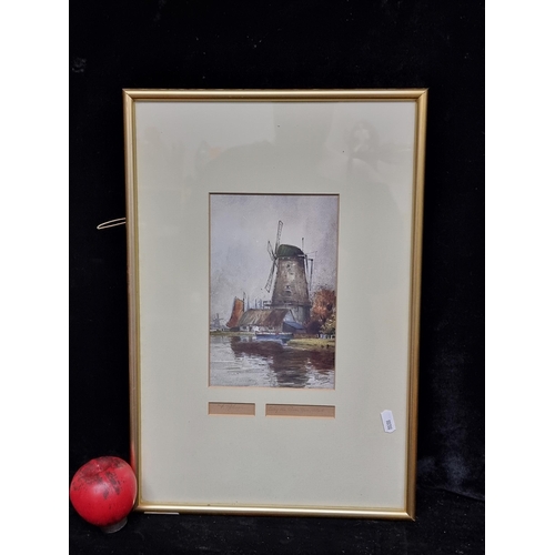 89 - A hand signed print of a F. Robson painting titled 'Along the River Meuse, Holland' Housed in a gilt... 