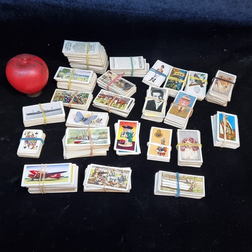 142 - A super large lot of cigarette cards including John Player's & Sons, Craven and Sweetule Products.