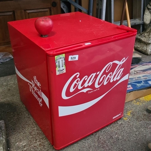 929 - A retro Coca-Cola branded Husky mini fridge, featuring the iconic red with white logo. Compact desig... 