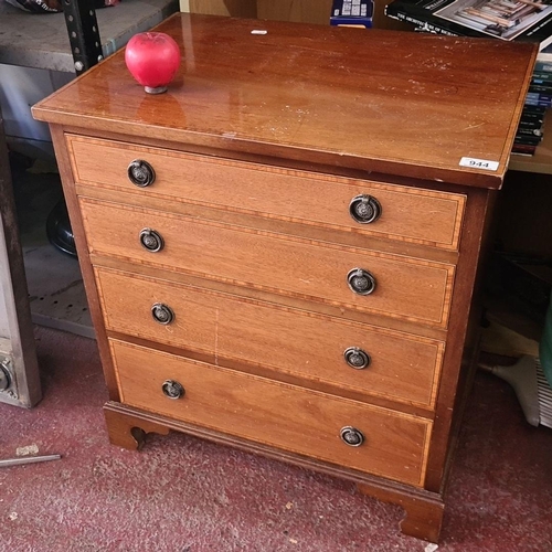 944 - A vintage four-drawer chest, with classic metal pull handles.