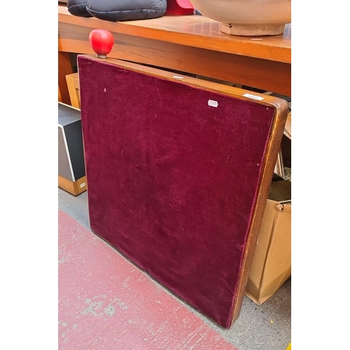 960 - Vintage velvet-topped wooden table, featuring a deep red plush surface with classic tapered legs. Un... 