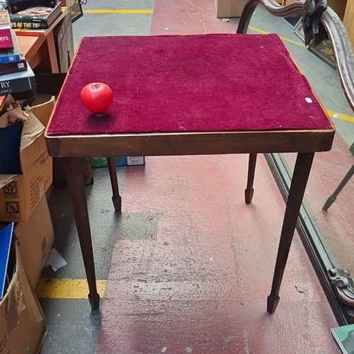 960 - Vintage velvet-topped wooden table, featuring a deep red plush surface with classic tapered legs. Un... 