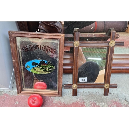 965 - Two vintage 'Southern Comfort'  framed advertising mirror along with an intricate wood framed mirror... 