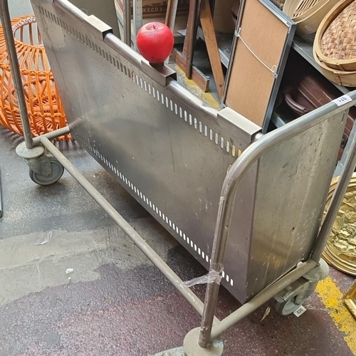 971 - An industrial very heavy duty metal rolling cart with sturdy construction and caster wheels. Was use... 