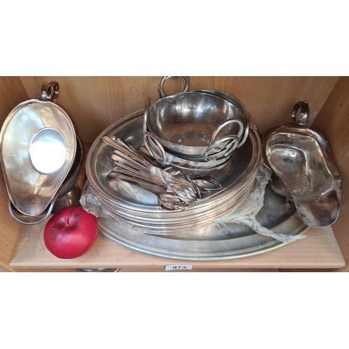 973 - An assortment of stainless  commercial tableware, including trays, serving dishes, gravy boats and f... 