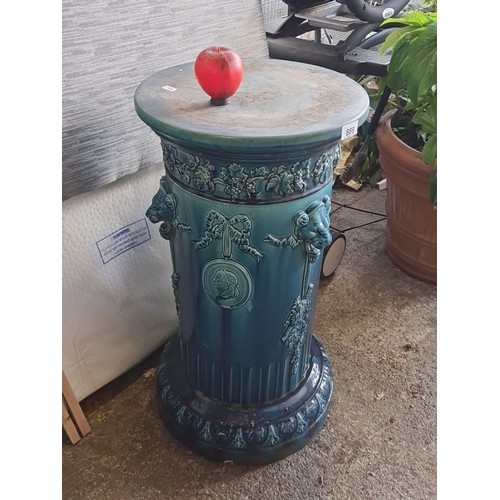 889 - Star Lot : A stunning neoclassical-style ceramic pedestal with high-relief grapevine and classical f... 