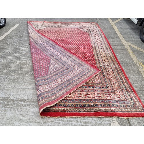 920 - Super Star Lot : A Very large magnificent hand made floor rug. Featuring ornate detailing and square... 