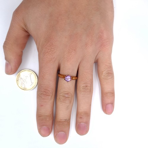 911 - Star Lot: A nine carat gold (375) amethyst stone ring. Size - N. Weight - 3 grams. Boxed.