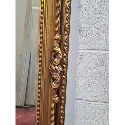 1021 - Star Lot : A lovely large antique  Gilt over mantle bevelled mirror in the empire style. Heavy very ... 