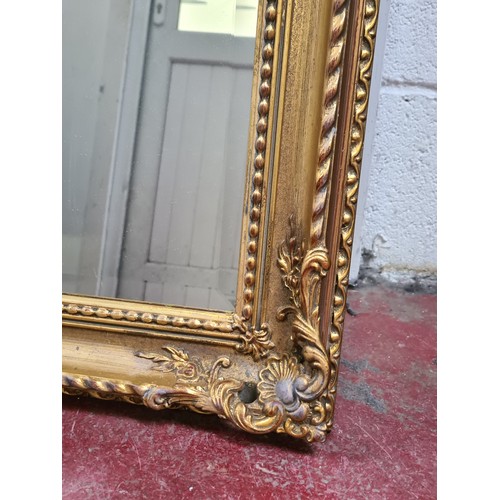 1021 - Star Lot : A lovely large antique  Gilt over mantle bevelled mirror in the empire style. Heavy very ... 