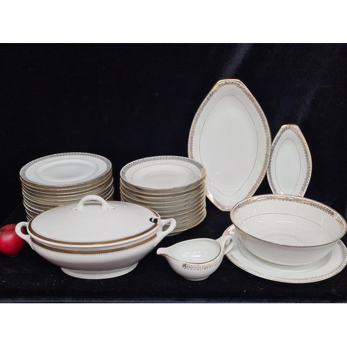 927 - A Lovely large dinner set by Emaux Dd Limoges, With lovely white porcelain and gold detail. Will put... 